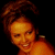 A pixelated image of a person with brown hair against black background, next to green text reading 'Original Icons .com' on solid dark green.