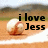 Pixelated image with text 'i love Jess' over a blurred background featuring a light-colored object with red accents.