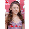 A person in a purple sequined dress with long brown hair appears in three variations against a red backdrop with white text and logos.