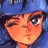 A pixelated anime-style character with blue hair and a blue helmet on the left, next to black background text reading 'Anime IM' above 'COM' in white pixelated font.