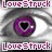 Pixelated eye with purple iris and black pupil, framed by pink text reading 'LoveStruck' at top and bottom.
