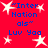 Red background with white starbursts and blue text reading "InterNationals" and "Luv Yaa" in pixelated font.