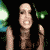 A pixelated animated sequence shows a person with long dark hair and light skin in a dark environment with green and blue light effects, transitioning through multiple facial expressions and hand positions.