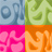 Four distinct pixelated symbols arranged in a 2x2 grid, each on solid-colored backgrounds with visible dithering and blocky rendering.