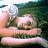 A pixelated image shows a person with dark hair holding their head, next to green text reading "OriginalIcons.com" on a solid background.