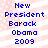 Blue pixelated text on a pink and white striped background with small white dots, reading 'New President Barack Obama 2009' in two identical vertical