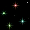 Black background with multiple star-like light bursts in red, green, and cyan hues scattered across the frame.