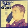 Pixelated image of a character with short brown hair holding a dark blue phone to their ear, wearing a red plaid shirt, with text above reading "Barbie did What with GI Joe?"