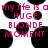 Pixelated pink text reads 'my life is a HUGE BLONDE MOMENT' over black circular shapes on white background.
