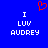Blue background with white pixelated text reading "I LUV AUDREY" on both sides and a red pixelated heart symbol above the left side.