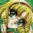 Pixelated close-up of a character with blonde hair, green eyes, and a green top against a green background.