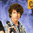 six pixelated images with text overlays: two people, a dog, and three text on colored backgrounds
