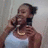A static image shows a person in a light blue tank top holding a phone to their ear, with text in pixelated white font on a dark green background.