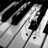 Black-and-white piano keys occupy the left side of a , while colorful musical notes fill the right side on dark and light backgrounds