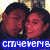 Two people in close pose with one person's head resting on the other's shoulder, displayed in a with text overlay