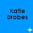 Blue background with repeated "Katie Drobes" text and animated white star-like shapes in a