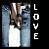 Pixelated image of a person in blue jeans and white shoes standing against a dark background with vertical text reading LOVE.