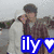 A four- shows a pixelated image of two people embracing, with overlaid text and heart symbols changing color