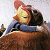 A pixelated animated contact sheet showing two frames of a cartoon character embracing on the left and green text reading "Original Icons .com" on the right against a dark background.