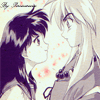 Two anime-style characters with dark and light hair face each other closely, blushing with red cheek marks, in a static composition with text overlays.