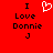 Red background with black text reading "I Love Donnie J" and a white pixelated heart symbol above the text on the left side.