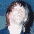 Six distinct figures in a with one red containing yellow text; some faces are pixelated
