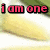 Pixelated text in red and pink letters on a blurred background with green and yellow tones.