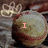 A pixelated softball with pink text overlays reading 'I', 'love', and 'SOFTBALL' across three , each with a faint paw print outline in the top-left corner
