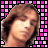 Two identical pixelated frames of a person with brown hair against a pink and white checkered border on a black background, presented as an animated contact sheet.