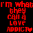 Red pixelated text on black background reads "I'm what they call a love addict" with a heart symbol, displayed in two identical vertical