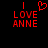 Red pixelated text 'I LOVE ANNE' on black background with a red heart symbol above the word 'LOVE', transitioning to a version without the heart.