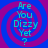 Four identical display cyan text 'Are You Dizzy Yet?' over a blue and magenta spiral background with no visible motion changes