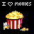 Pixel art of a red-and-white striped popcorn bucket with yellow popcorn, accompanied by small scattered kernels and a gray-and-yellow object on black background.