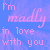 Pixelated text reads "I'm madly in love with you" on a blue-purple gradient background, displayed across four identical