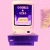Pixelated image of a computer monitor with purple and blue screen displaying abstract shapes on pink background.