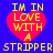 Four identical pixelated images of a red heart with yellow text on blue background, each reading "IM IN LOVE WITH A STRIPPER".