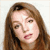 Static 50x50 pixel icon showing a close-up of a person with long brown hair against a plain background.