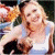 A pixelated image shows a person with light hair holding an orange drink, next to green text reading "Original Icons .com" on a dark background.