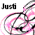 Pixelated black text 'Just' appears above a chaotic arrangement of pink, gray, and black pixel clusters forming abstract shapes on white background.