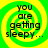 Four identical circular frames with green and yellow spiral backgrounds display the text "you are getting sleepy..." in black pixelated font.