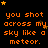 Orange pixelated text repeats 'you shot across my sky like a meteor.' on black background with scattered yellow stars.