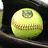 A yellow softball with brown stitching and a gray logo on top, displayed against a dark background with blue text appearing on the right side.