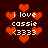 Pixelated red hearts surround white text reading 'i love cassie (3333)' on a dark brown background.
