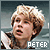 Pixelated static image of a person with light brown hair and open mouth against blurred background, with text label "PETER" in bottom-right corner.