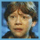 Four- shows a person with brown hair in three expressions and text reading 'Can we panic now?' on black background