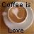 Pixelated image of a coffee cup on a saucer with text reading 'Coffee is Love' in dark brown letters.