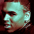 Pixelated profile view of a person with light skin tone, dark hair, and a visible ear, rendered in teal and brown tones against a dark background.
