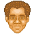 Pixelated head with brown curly hair, light skin tone, closed eyes, and a neutral expression on gray background.