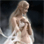 Pixelated figure of a person with long hair in a flowing dress holding a small object against a dark background.