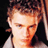 Static 48x48 pixel icon showing a close-up of a person's face with light brown hair and fair skin, rendered in low-resolution pixel art style against dark background.